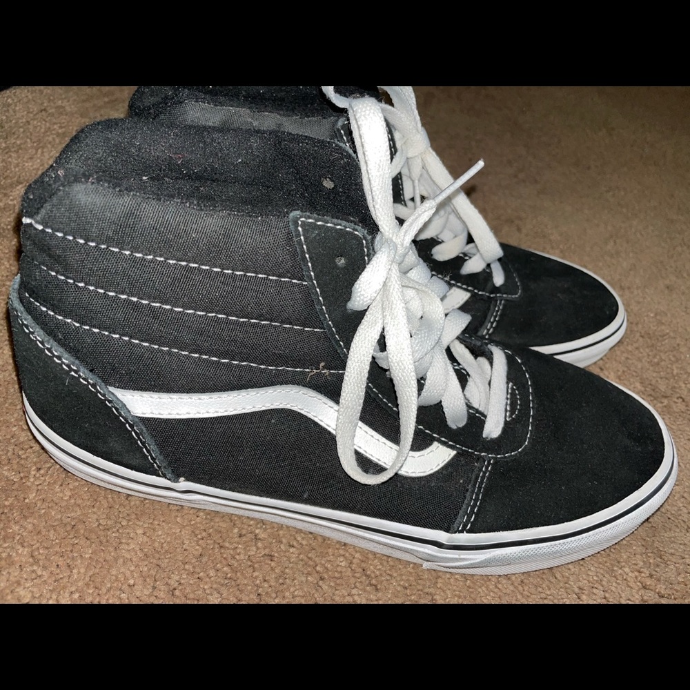 Black and white Vans sneakers
